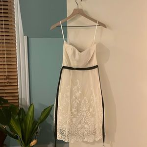 Minuet small strapless mini dress in cream with removable black belt